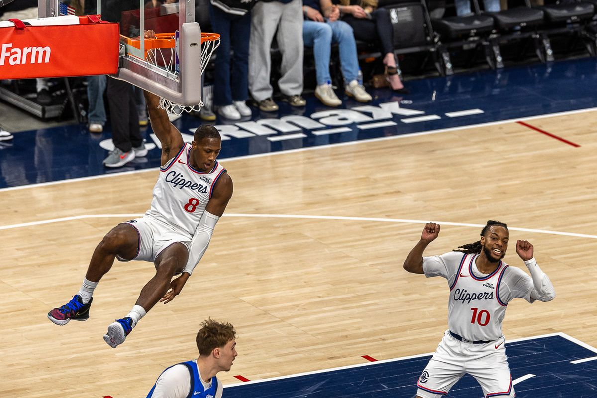 Los Angeles Clippers guard Kris Dunn (8) dunks the ball during an NBA basketball game against the Dallas Mavericks, Tuesday April 7, 2026 in Inglewood, Calif.