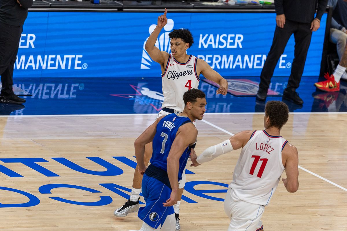 Los Angeles Clippers guard Kobe Sanders (4) celebrates during an NBA basketball game against the Dallas Mavericks, Tuesday April 7, 2026 in Inglewood, Calif.