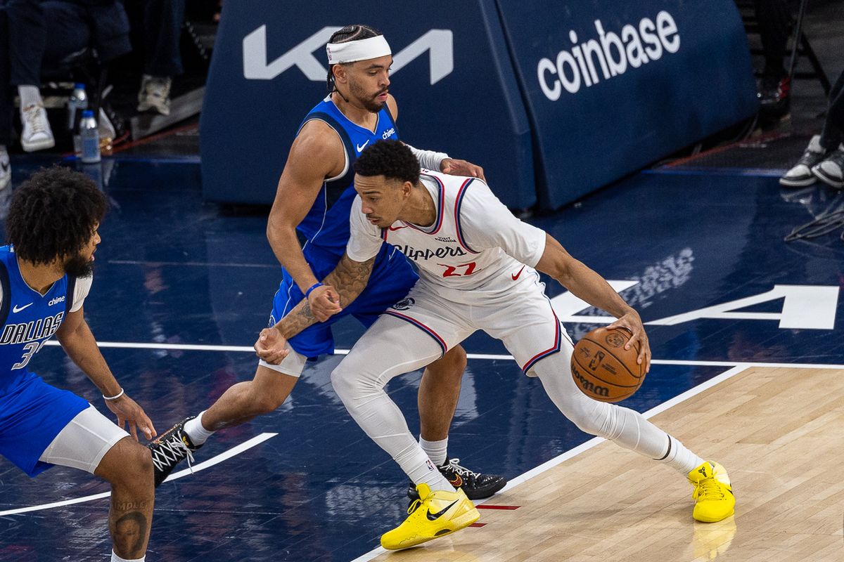 Los Angeles Clippers guard Jordan Miller (22) dribbles during an NBA basketb