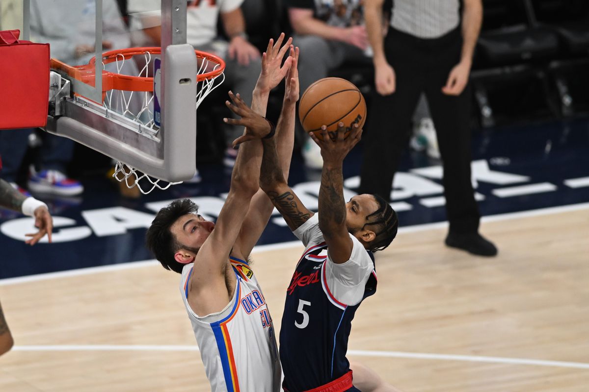 Los Angeles Clippers forward Derrick Jones Jr. (5) shoots over OKC Thunder center Chet Holmgren (7) during a game between the Los Angeles Clippers and OKC Thunder on Wednesday, April 8, 2026 at Intuit Dome in Inglewood Calif