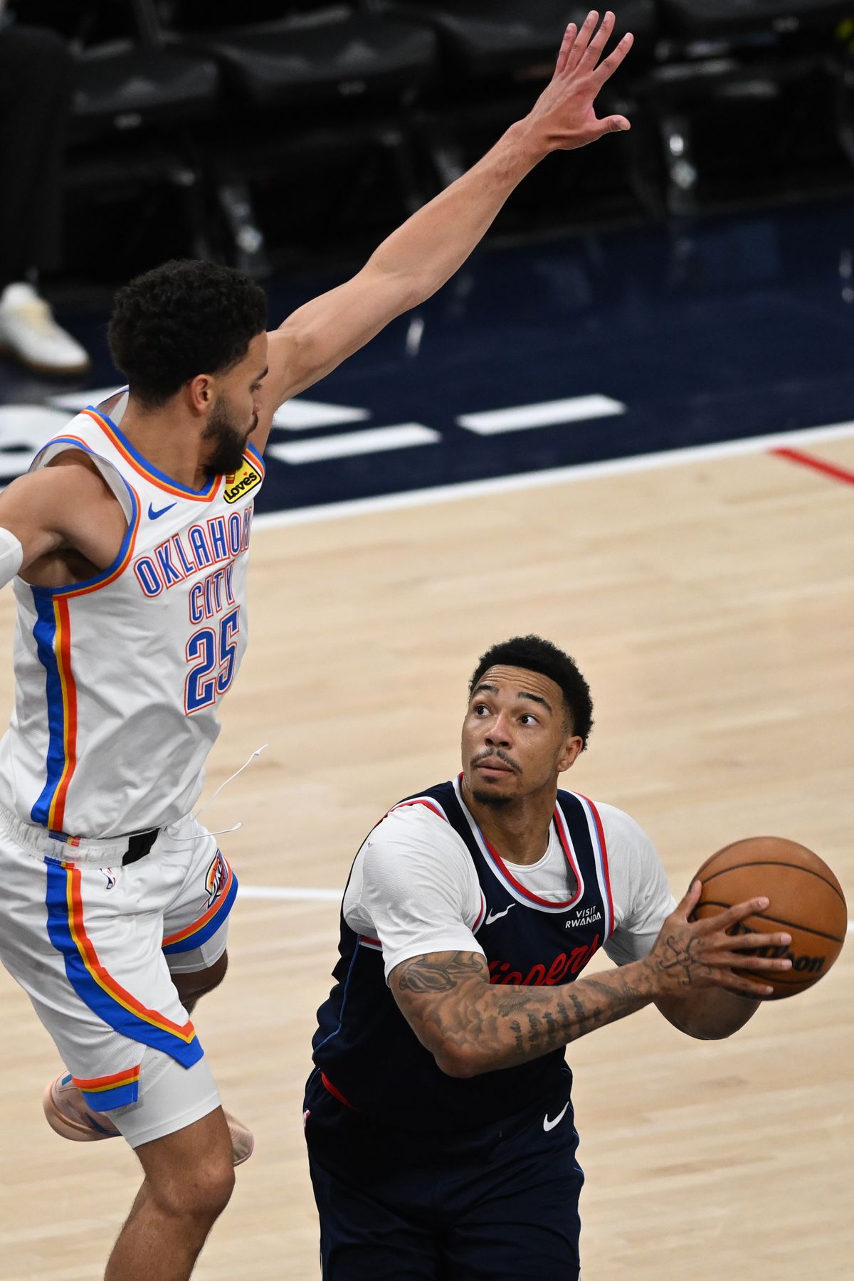 Los Angeles Clippers guard Jordan Miller (22) fakes off the defender during a game between the Los Angeles Clippers and OKC Thunder on Wednesday, April 8, 2026 at Intuit Dome in Inglewood Calif