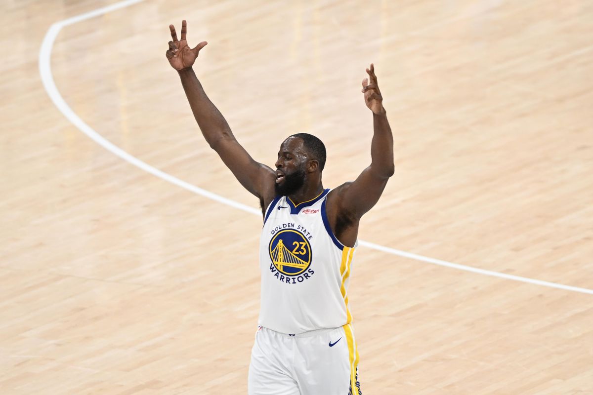 Golden State Warriors forward Draymond Green (23) lifts his hands up after a three pointer by Steph Curry  during a game between the Los Angeles Clippers and Golden State Warriors on Wednesday, April 15, 2026 at Intuit Dome in Inglewood Calif
