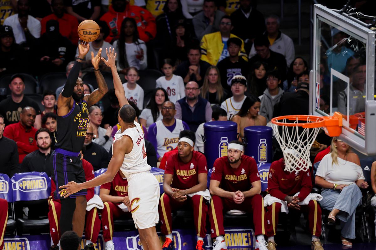 LeBron James #23 of the Los Angeles Lakers shoots the ball over Evan Mobley #4 of the Cleveland Cavaliers during an NBA basketball game, Tuesday March 31, 2026 in Los Angeles, Calif.
