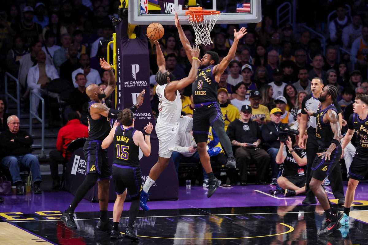 James Harden #1 of the Cleveland Cavaliers lays the ball up against Bronny James #9 of the Los Angeles Lakers during an NBA basketball game, Tuesday March 31, 2026 in Los Angeles, Calif.