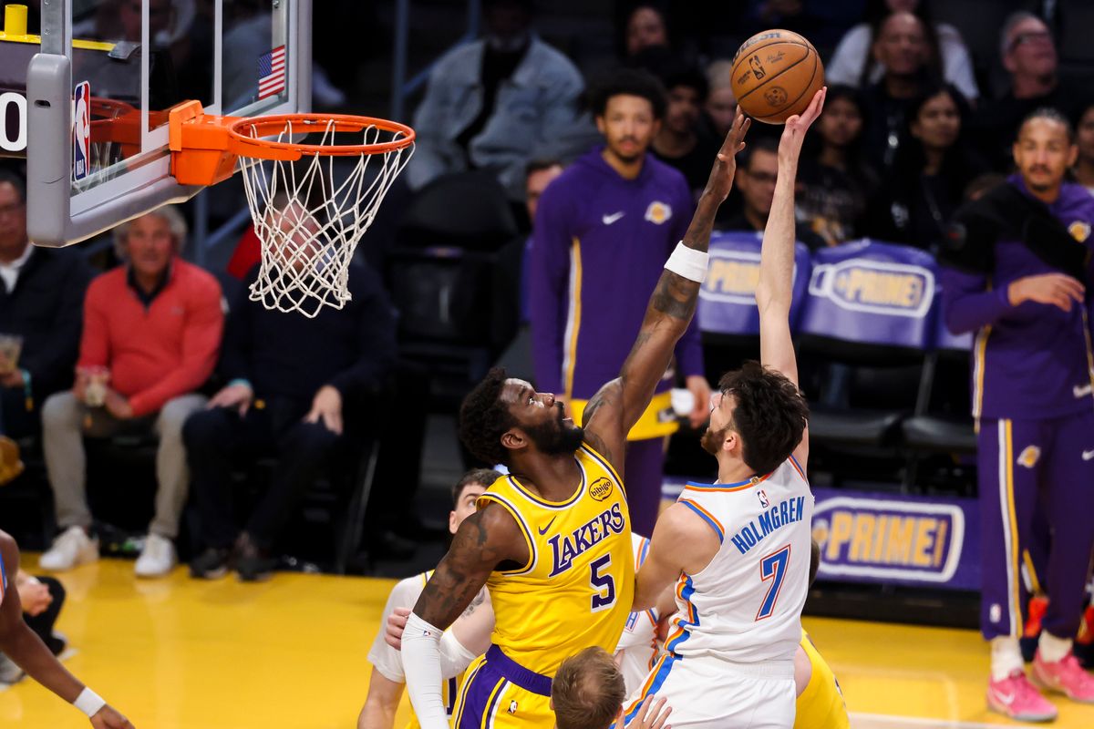 Chet Holmgren #7 of the Oklahoma City Thunder shoots the ball over Deandre Ayton #5 of the Los Angeles Lakers during an NBA basketball game, Tuesday April 7, 2026 in Los Angeles, Calif.