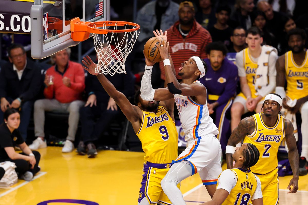 Shai Gilgeous-Alexander #2 of the Oklahoma City Thunder drives towards the rim during an NBA basketball game against the Los Angeles Lakers, Tuesday April 7, 2026 in Los Angeles, Calif.