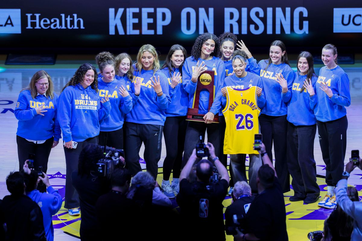 The NCAA National Champion UCLA Bruins Women’s Basketball team is honored on the floor during an NBA basketball game between the Los Angeles Lakers and Oklahoma City Thunder, Tuesday April 7, 2026 in Los Angeles, Calif.