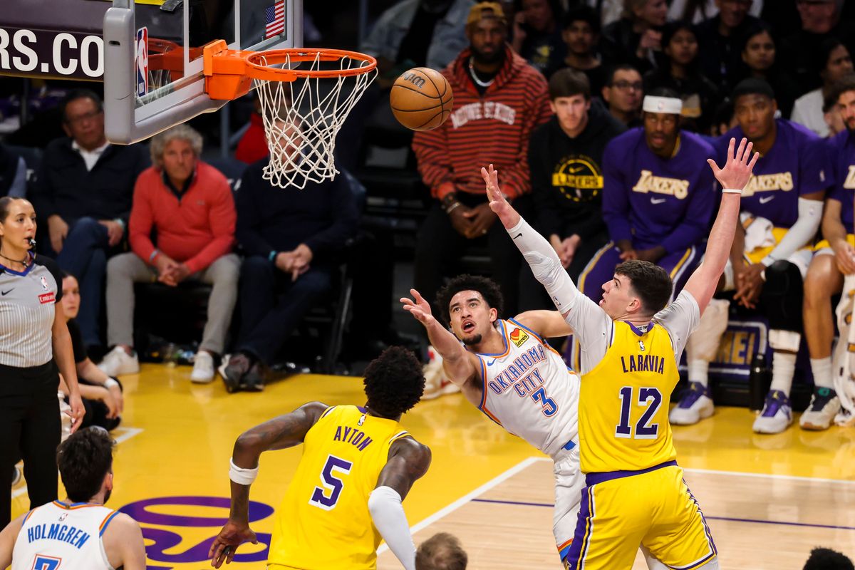 Jared McCain #3 of the Oklahoma City Thunder lays the ball up during an NBA basketball game against the Los Angeles Lakers, Tuesday April 7, 2026 in Los Angeles, Calif.