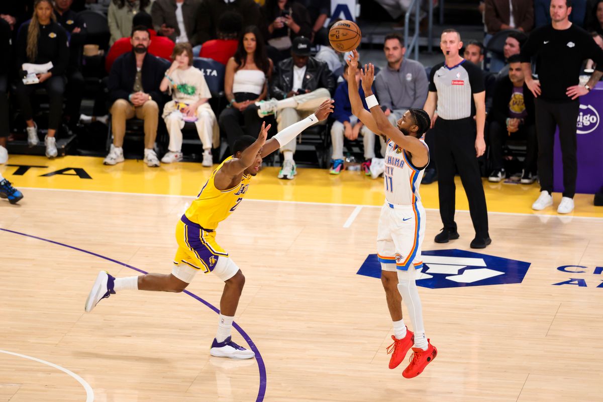 Isaiah Joe #11 of the Oklahoma City Thunder shoots the ball over Rui Hachimura #28 of the Los Angeles Lakers during an NBA basketball game, Tuesday April 7, 2026 in Los Angeles, Calif.