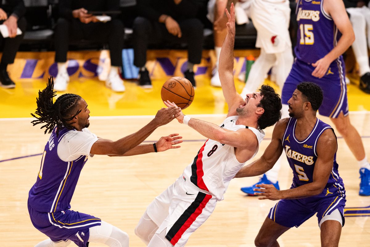 Portland Trailblazers forward Deni Avdija (8) gets fouled in the paint during an NBA basketball game against Los Angeles Lakers, Tuesday, October 27, 2026 in Los Angeles.