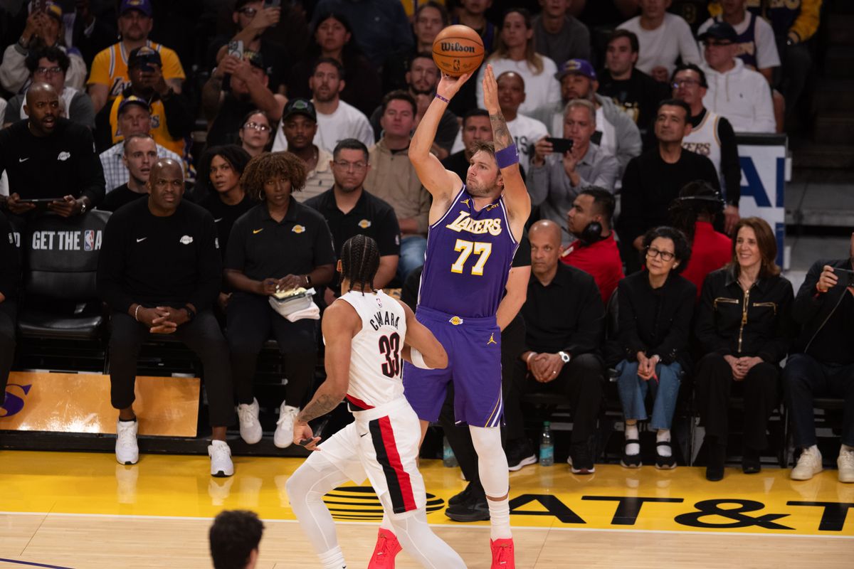 Los Angeles Lakers guard Luka Doncic (77) fires a three pointer during an NBA basketball game against Portland Trailblazers, Tuesday, October 27, 2026 in Los Angeles.