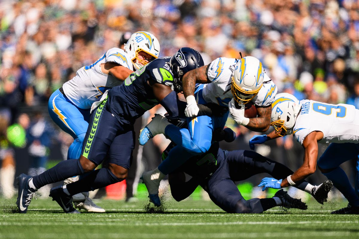 Los Angeles Chargers running back Omarion Hampton (8) dives with the ball during an NFL game between the Los Angeles Chargers and Seattle Seahawks on Sunday, October 4, 2026 at Lumen Field in Seattle, Washington Los Angeles Chargers running back Omarion Hampton (8) dives with the ball during an NFL game between the Los Angeles Chargers and Seattle Seahawks on Sunday, October 4, 2026 at Lumen Field in Seattle, Washington
