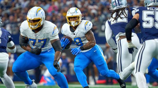 Los Angeles Chargers running back Omarion Hampton #8 runs the football during an NFL football game against the Dallas Cowboys, on Sunday December 21, 2025 in Arlington, Texas.