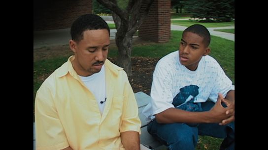 Byron Jackson sits on a table with his brother Desean. Byron Jackson sits on a table with his brother Desean.