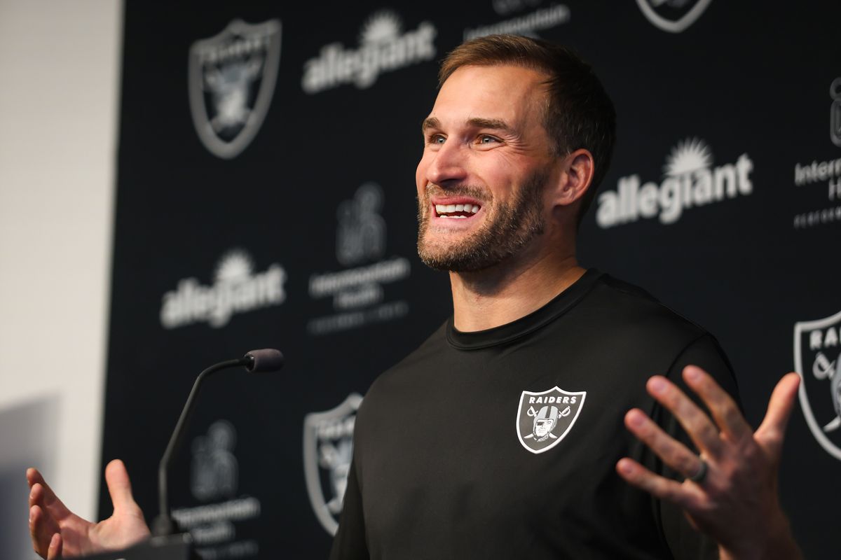 Las Vegas Raiders quarterback Kirk Cousins laughs while speaking to the media in a press conference, Wednesday April 8, 2026 in Henderson, Nev.