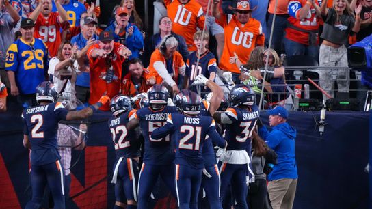 Denver Broncos safety Talanoa Hufanga #9 celebrates with fans after intercepting the football for a pick six during an NFL football game against the Los Angeles Rams, on Sunday September 27, 2026 in Denver, CO.