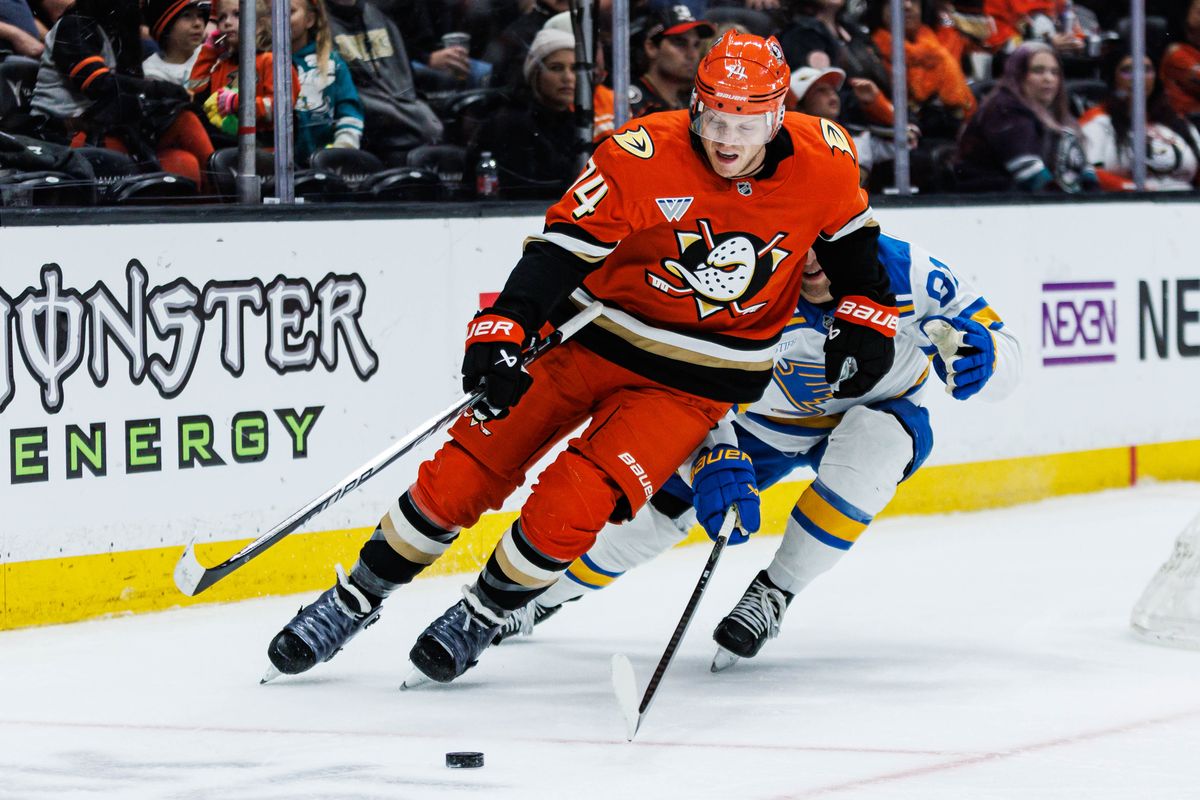 Anaheim Ducks defenseman John Carlson (#74) defends the puck during an NHL match against the St. Louis Blues on April 3, 2026 in Anaheim, California.
