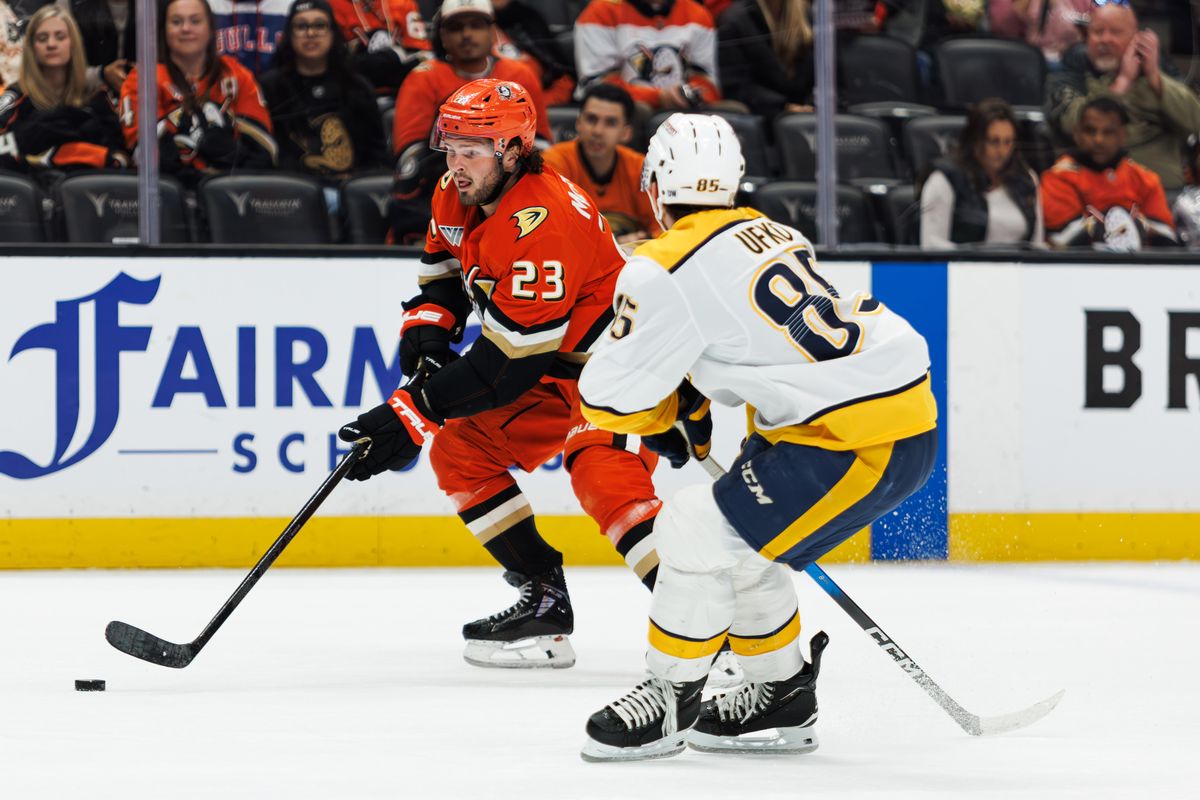 Anaheim Ducks center Mason McTavish (23) defends the puck during an NHL hockey game against the Nashville Predators, Tuesday April 7, 2026 in Anaheim, Calif. Anaheim Ducks center Mason McTavish (23) defends the puck during an NHL hockey game against the Nashville Predators, Tuesday April 7, 2026 in Anaheim, Calif.