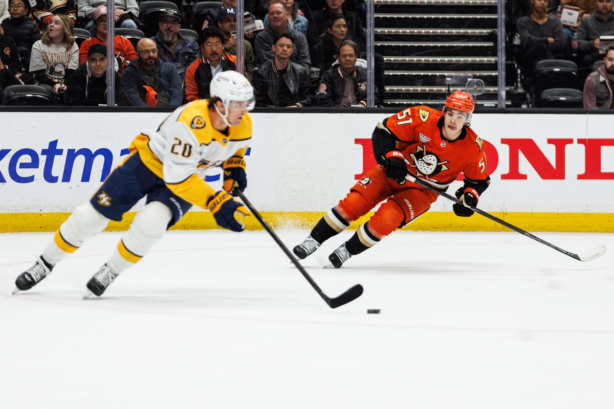 Anaheim Ducks defenseman Olen Zellweger (51) chases the puck during an NHL hockey game against the Nashville Predators, Tuesday April 7, 2026 in Anaheim, Calif. Anaheim Ducks defenseman Olen Zellweger (51) chases the puck during an NHL hockey game against the Nashville Predators, Tuesday April 7, 2026 in Anaheim, Calif.