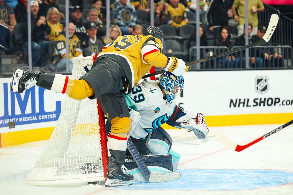 Vegas Golden Knights F Keegan Kolesar (55) falls on top of Seattle Kraken G Nikke Kokko (39) during an NHL game on Wednesday, April 15, 2026, in Las Vegas, Nevada. 