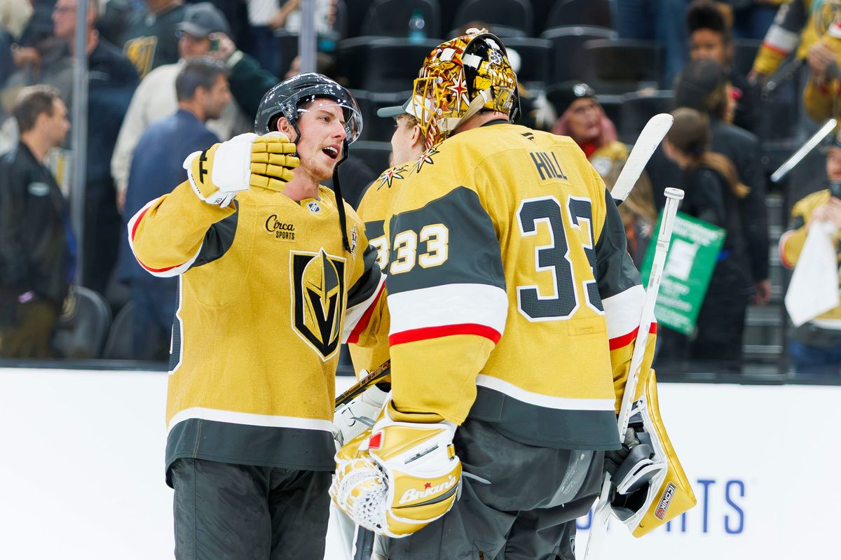 Vegas Golden Knights right wing Mitch Marner (93) congratulates Vegas Golden Knights goaltender Adin Hill (33) on a win after an NHL game against the Ottawa Senators on Tuesday, October 27, 2026, at T-Mobile Arena in Las Vegas, Nevada.