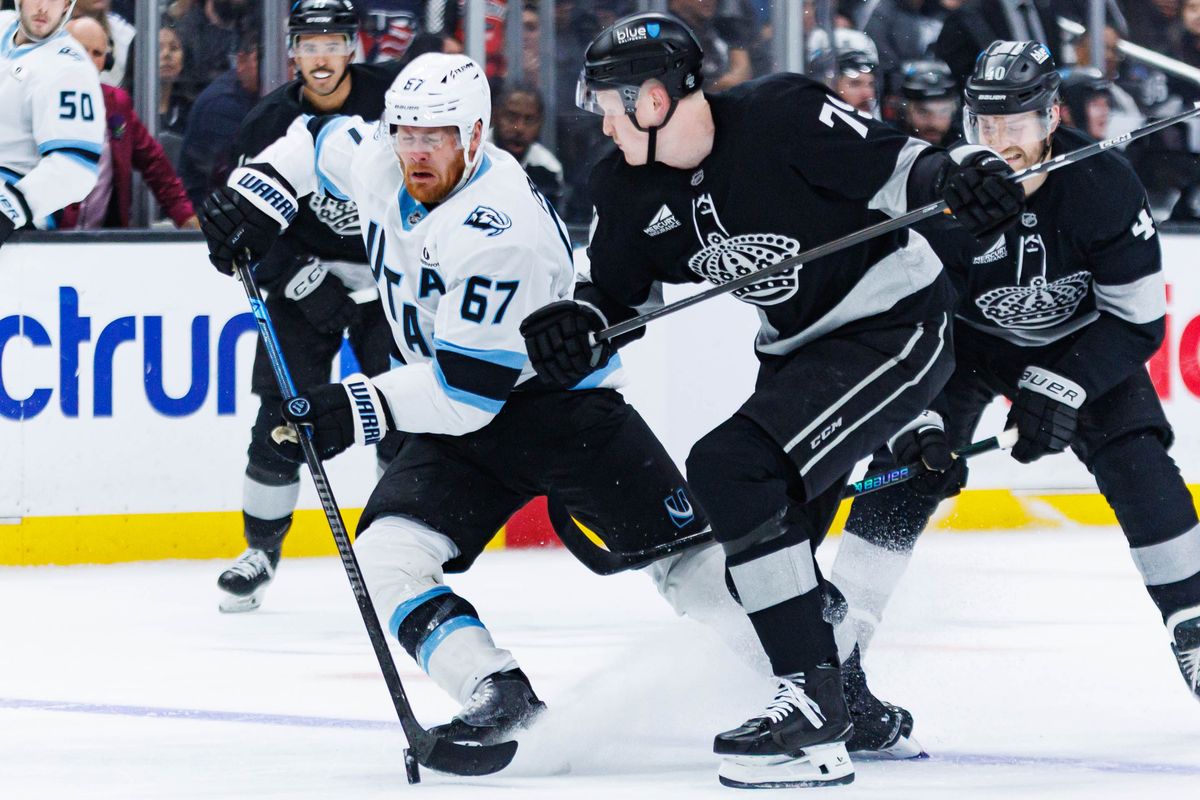 Utah Mammoth left wing Lawson Crouse (#67) closes his eyes as he anticipates a hit during an NHL match against the Los Angeles Kings on March 28, 2026 in Los Angeles, California.