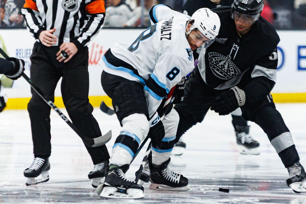 Utah Mammoth center Nick Schultz (#8) wins the face-off during an NHL match against the Los Angeles Kings on March 28, 2026 in Los Angeles, California.