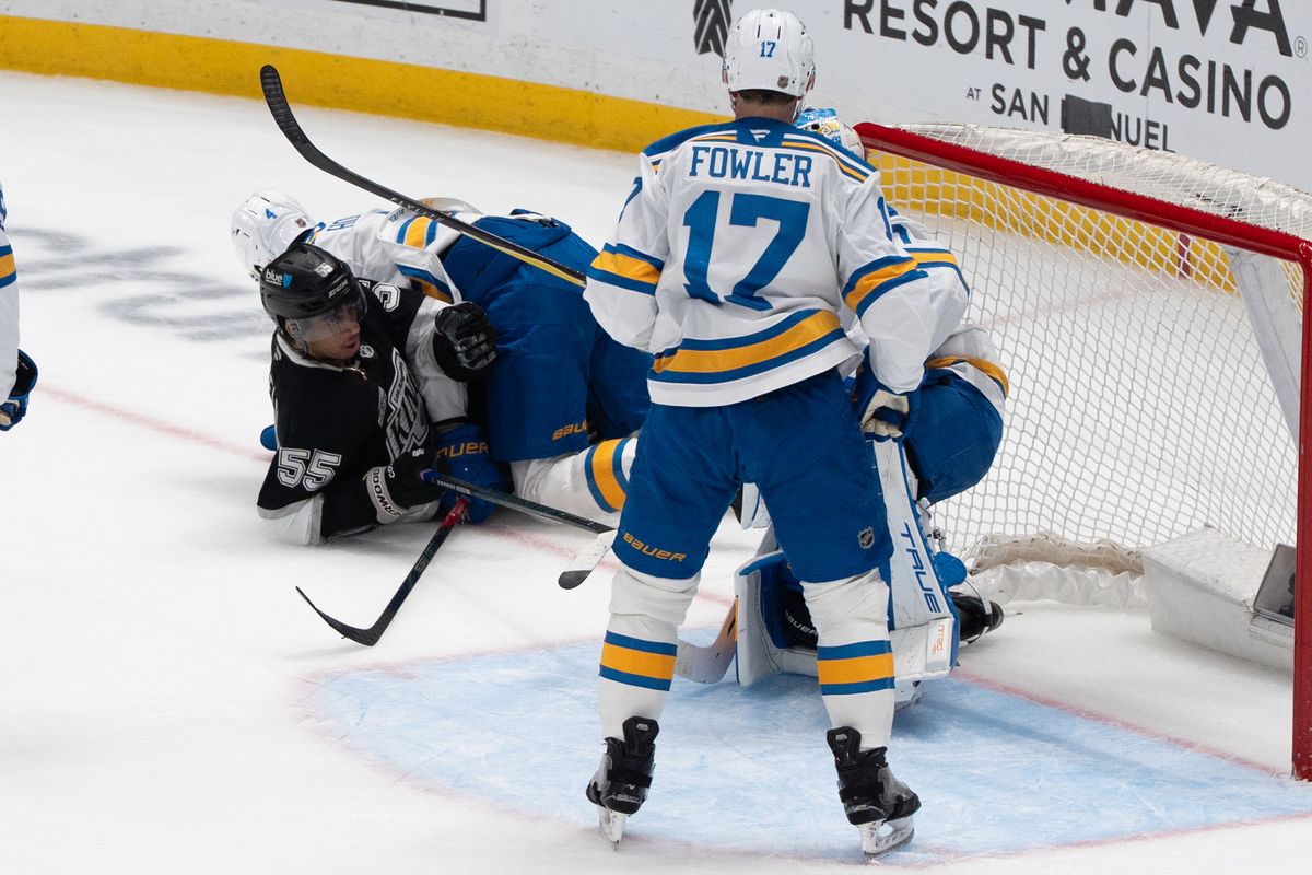 Los Angeles Kings Right Wing Quinton Byfield (55) gets taken out and landed on during an NHL match against the St. Louis Blues on April 1st, 2026 in Los Angeles, California.