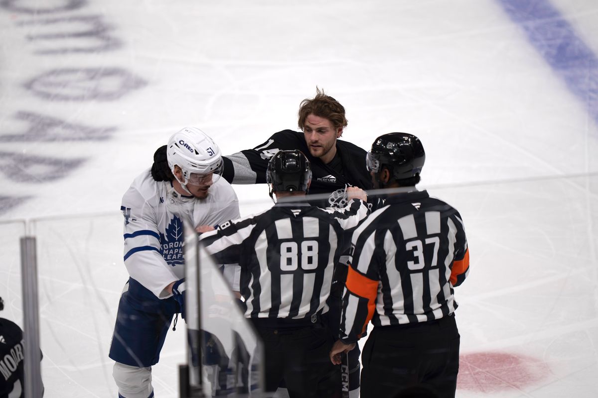 Los Angeles Kings right wing Alex Laferriere (14) punches the back of the head of an opponent during an NHL hockey game against the Toronto Maple Leafs on April 4th, 2026 in Los Angeles, CA.