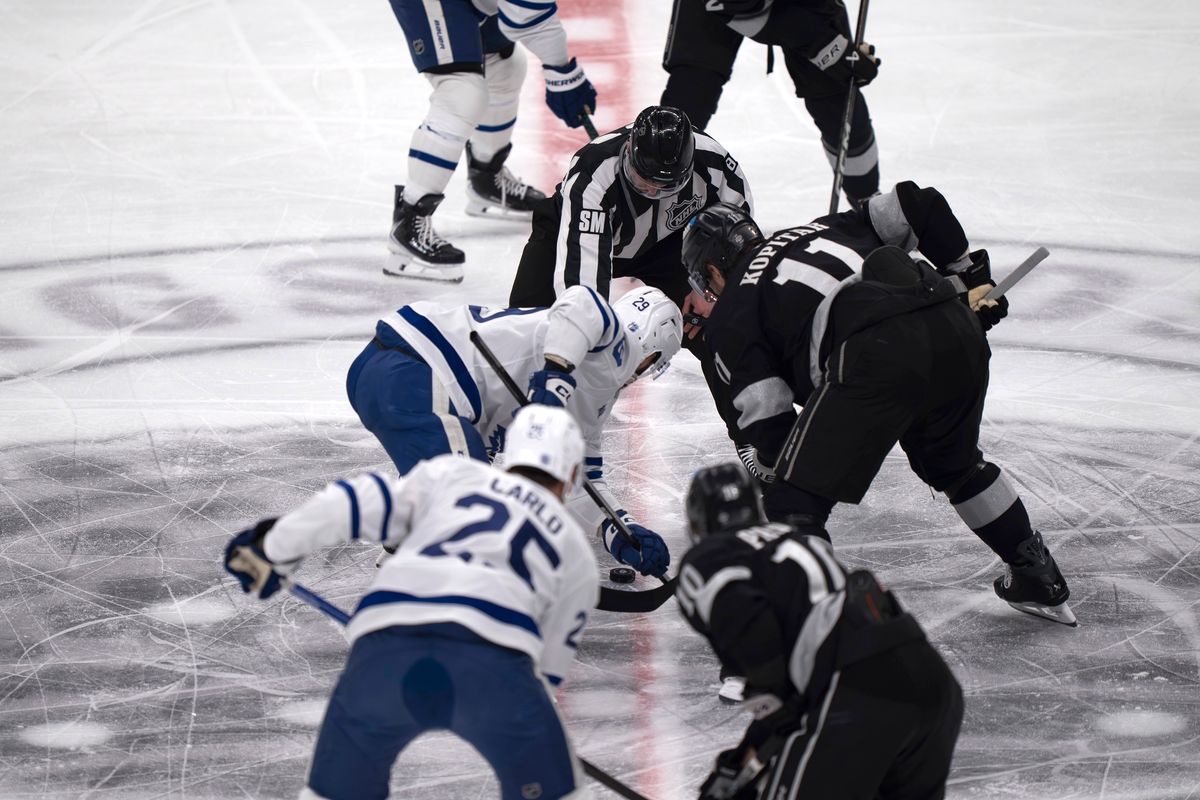 Los Angeles Kings center Anze Kopitar (11) faces off for puck drop during an NHL hockey game against the Toronto Maple Leafs on April 4th, 2026 in Los Angeles, CA.