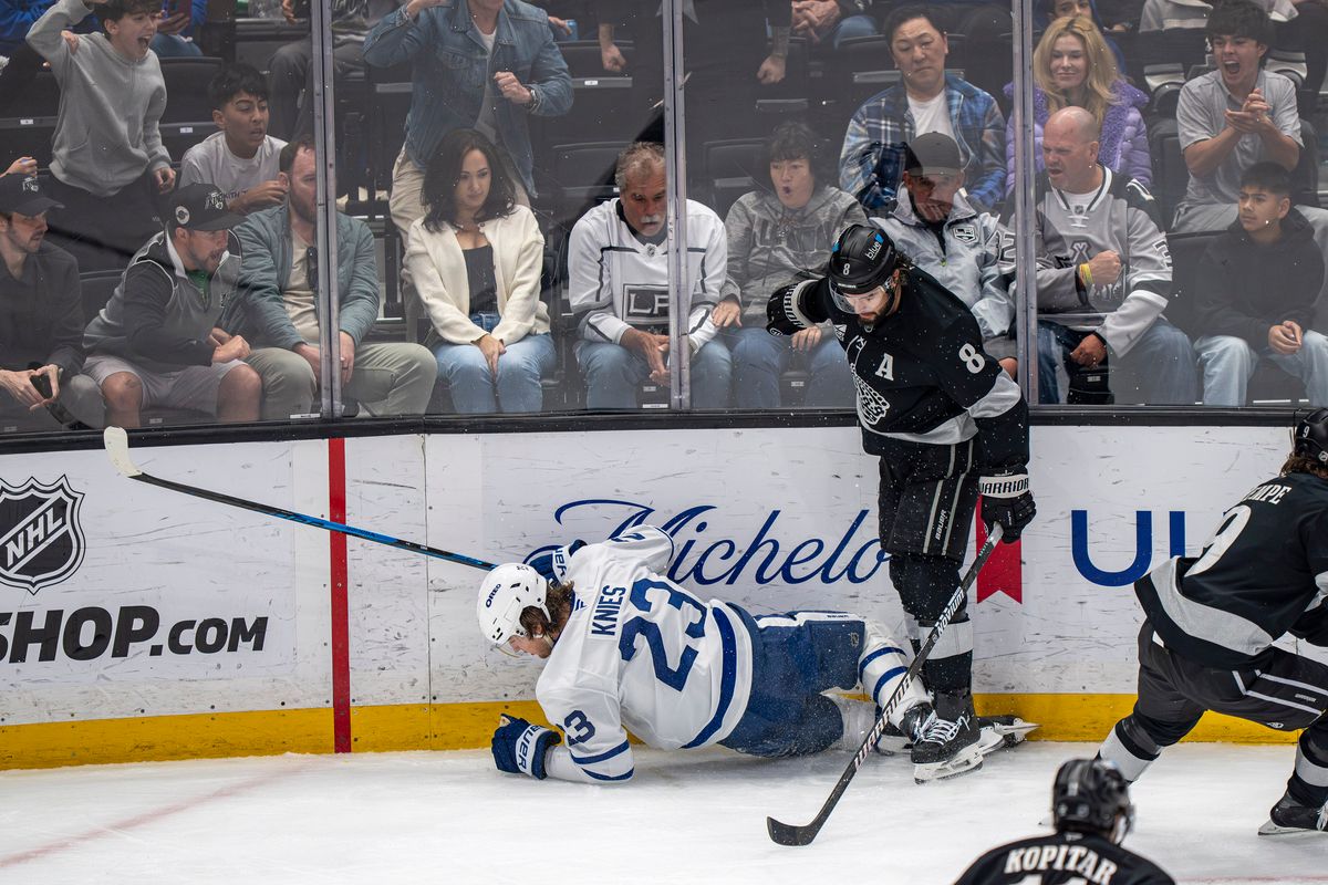 Los Angeles Kings defenseman Drew Doughty (8) standing over Matthew Knies of the Maple Leafs during an NHL hockey game against the Toronto Maple Leafs on April 4th, 2026 in Los Angeles, CA.