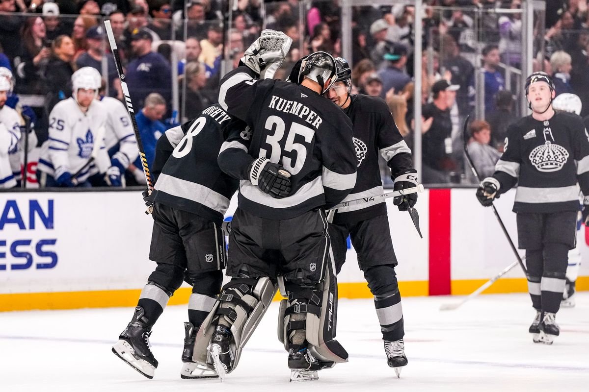Los Angeles Kings players celebrating winning in overtime during an NHL hockey game against the Toronto Maple Leafs on April 4th, 2026 in Los Angeles, CA.