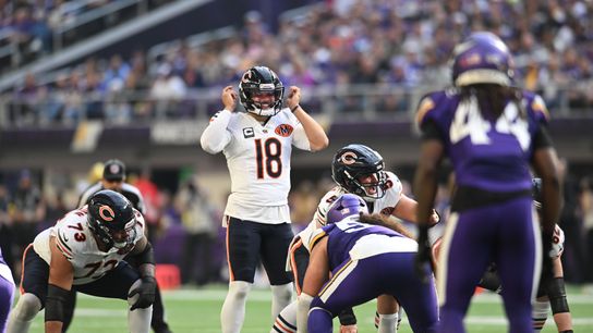Nov 16, 2025; Minneapolis, Minnesota, USA; Chicago Bears quarterback Caleb Williams (18) calls a play during the second quarter against the Minnesota Vikings at U.S. Bank Stadium.