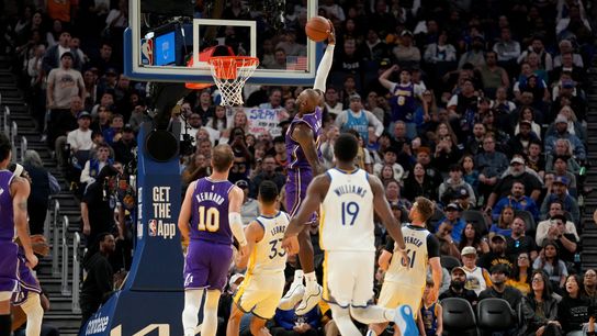 Los Angeles Lakers forward LeBron James (23) dunks the ball against the Golden State Warriors in the fourth quarter at the Chase Center. 