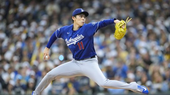 Los Angeles Dodgers pitcher Roki Sasaki (11) throws a pitch during the first inning against the Milwaukee Brewers at American Family Field. Los Angeles Dodgers pitcher Roki Sasaki (11) throws a pitch during the first inning against the Milwaukee Brewers at American Family Field.