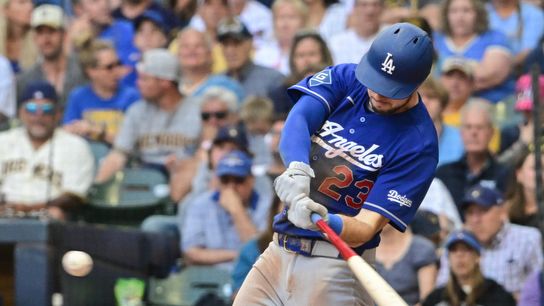 Los Angeles Dodgers right fielder Kyle Tucker (23) hits a triple to drive in two runs against the Milwaukee Brewers in the fifth inning at American Family Field. 
