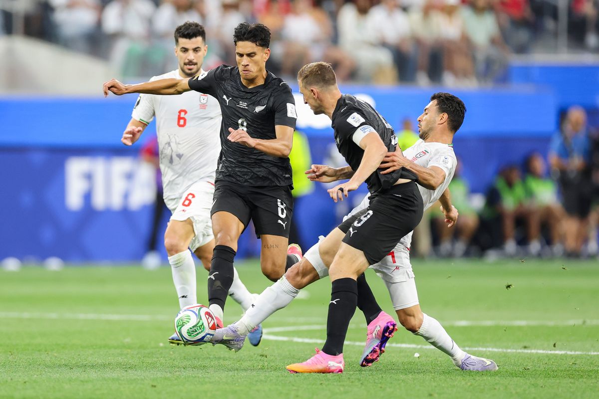 Shoja Khalilzadeh #4 of Iran battles for the ball with Marko Stamenić #8 and Chris Wood #9 of New Zealand during a 2026 FIFA World Cup match, Monday June 15, 2026 in Inglewood, Calif. Shoja Khalilzadeh #4 of Iran battles for the ball with Marko Stamenić #8 and Chris Wood #9 of New Zealand during a 2026 FIFA World Cup match, Monday June 15, 2026 in Inglewood, Calif.