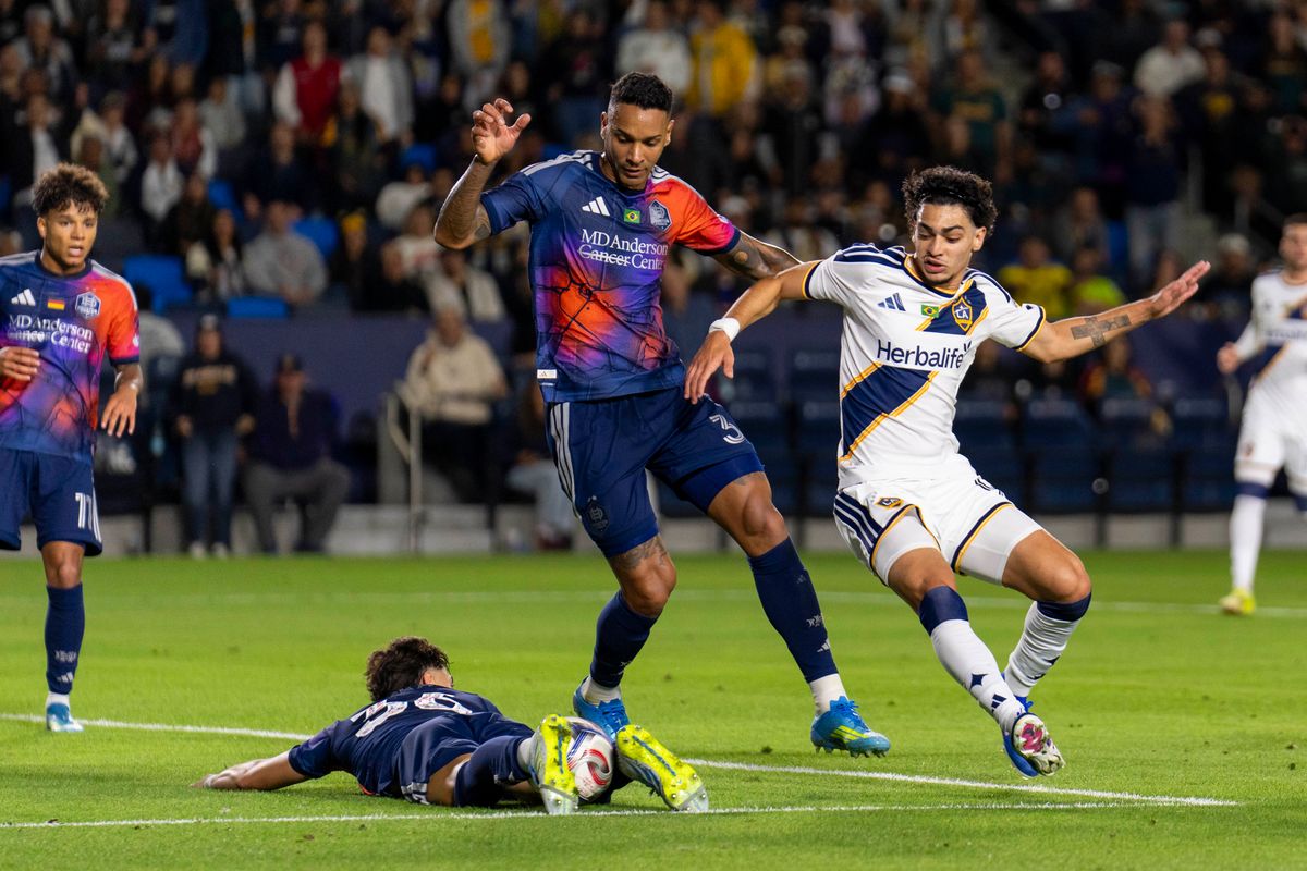 Los Angeles Galaxy forward Matheus Nascimento (9) fighting for the ball during an MLS soccer game against the Houston Dynamo FC, Saturday May 23rd, 2026 in Carson, California. Los Angeles Galaxy forward Matheus Nascimento (9) fighting for the ball during an MLS soccer game against the Houston Dynamo FC, Saturday May 23rd, 2026 in Carson, California.