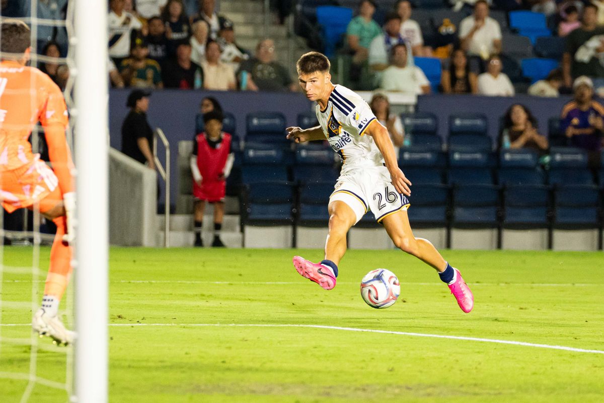 Los Angeles Galaxy defender Harbor Miller (26) passes the ball during an MLS game, against the San Jose Earthquakes on Wednesday August 19th, 2026 in Carson, Calif