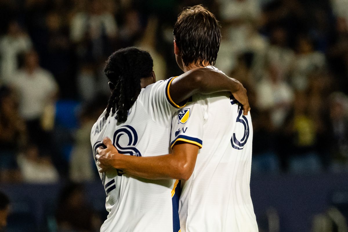 Los Angeles Galaxy forward Joseph Paintsil (28) and defender Julian Aude celebrate a goal during an MLS game, against the San Jose Earthquakes on Wednesday August 19th, 2026 in Carson, Calif