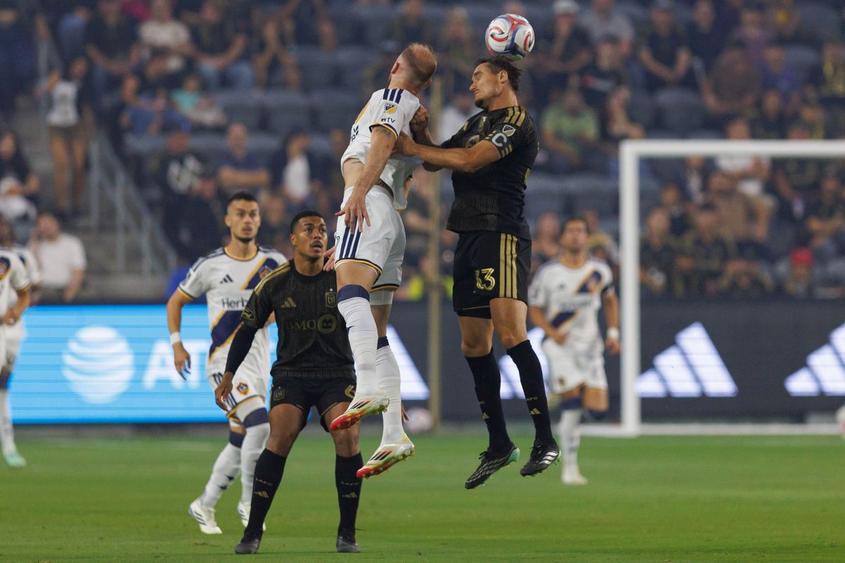 Aaron Long #33 of LAFC heads the ball during an MLS regular season match against LA Galaxy on October 25, 2026 at BMO Stadium in Los Angeles, California.