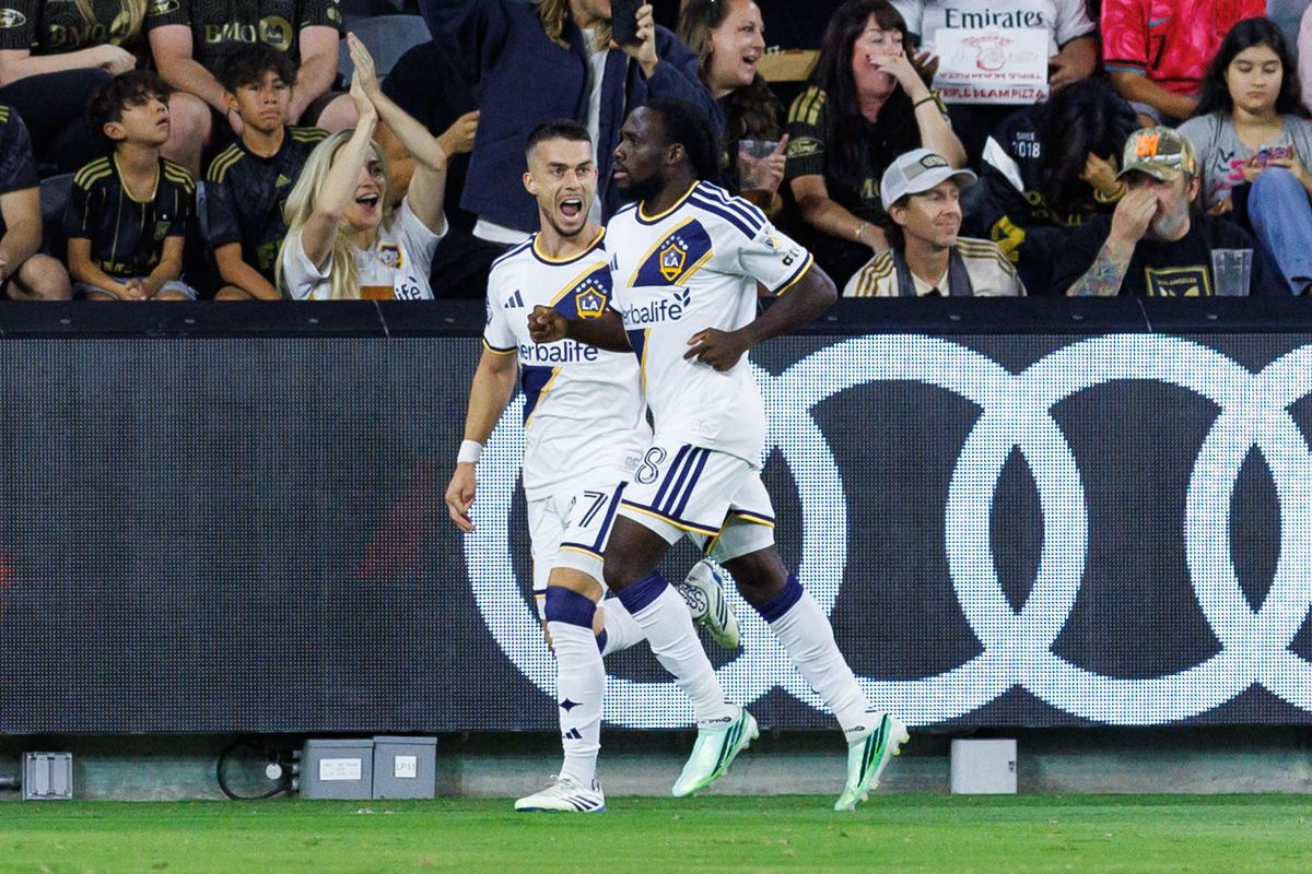 Joseph Paintsil #8 of LA Galaxy celebrates a goal with Erik Thommy #27 of LA Galaxy during an MLS regular season match against LAFC on October 25, 2026 at BMO Stadium in Los Angeles, California.