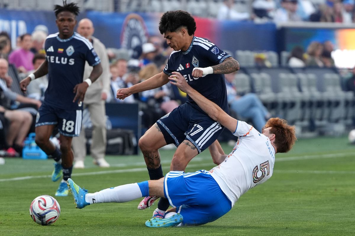 San Diego FC defender Kieran Sargeant (5) slides for the ball during an MLS soccer game against the Vancouver Whitecaps, Saturday May 23, 2026 in San Diego, California. San Diego FC defender Kieran Sargeant (5) slides for the ball during an MLS soccer game against the Vancouver Whitecaps, Saturday May 23, 2026 in San Diego, California.