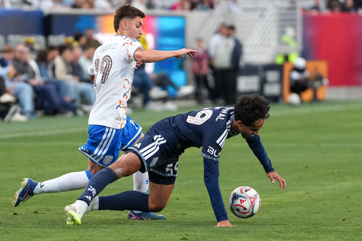 San Diego FC midfielder David Vazquez (19) battles for the ball during an MLS soccer game against the Vancouver Whitecaps, Saturday May 23, 2026 in San Diego, California. San Diego FC midfielder David Vazquez (19) battles for the ball during an MLS soccer game against the Vancouver Whitecaps, Saturday May 23, 2026 in San Diego, California.