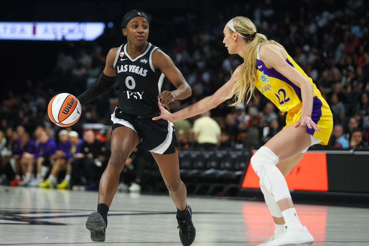 Las Vegas Aces guard Jackie Young (0) dribbles the ball during a WNBA game between the Las Vegas Aces and the Los Angeles Sparks, Saturday May 23, 2026 in Las Vegas, Nev. Las Vegas Aces guard Jackie Young (0) dribbles the ball during a WNBA game between the Las Vegas Aces and the Los Angeles Sparks, Saturday May 23, 2026 in Las Vegas, Nev.