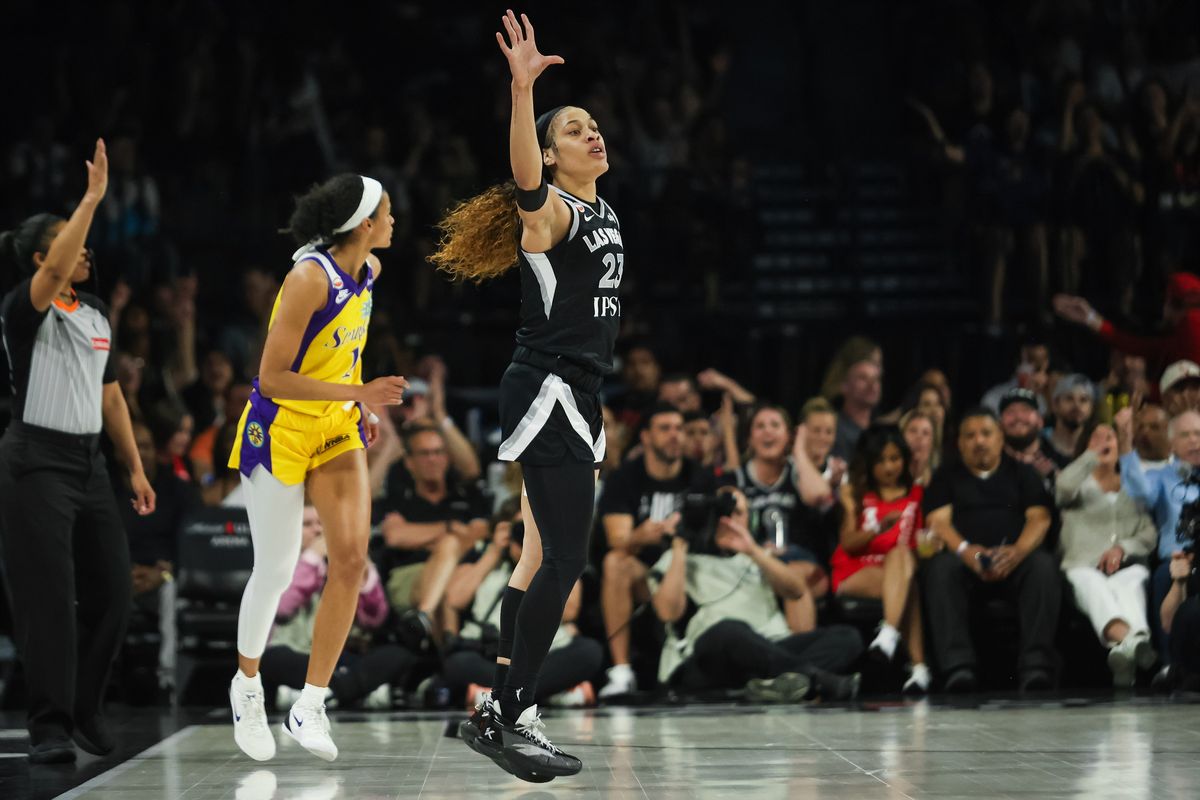 Las Vegas Aces guard Chennedy Carter (23) celebrates after scoring a three-point shot during a WNBA game between the Las Vegas Aces and the Los Angeles Sparks, Saturday May 23, 2026 in Las Vegas, Nev. Las Vegas Aces guard Chennedy Carter (23) celebrates after scoring a three-point shot during a WNBA game between the Las Vegas Aces and the Los Angeles Sparks, Saturday May 23, 2026 in Las Vegas, Nev.