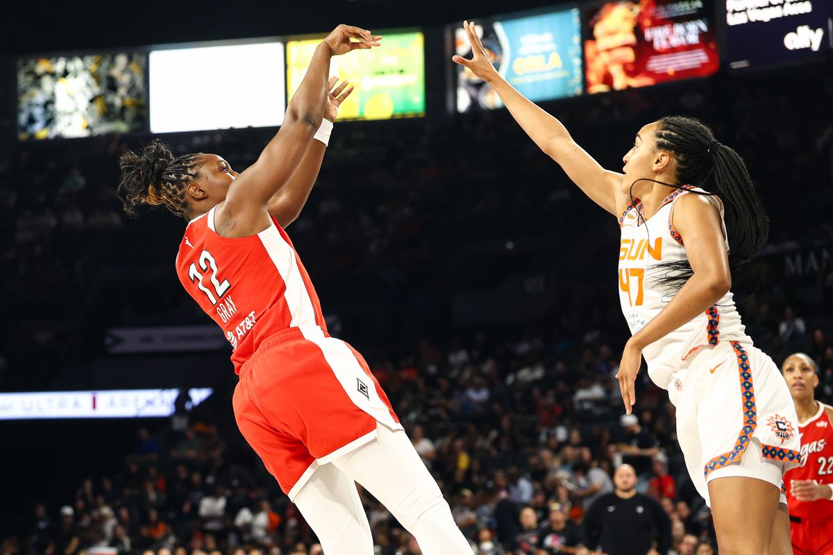 Las Vegas Aces guard Chelsea Gray (12) makes a basket guarded by Connecticut Sun guard Leila Lacan (47) on Thursday, August 20, 2026, at Michelob ULTRA Arena in Las Vegas, Nevada. Las Vegas Aces guard Chelsea Gray (12) makes a basket guarded by Connecticut Sun guard Leila Lacan (47) on Thursday, August 20, 2026, at Michelob ULTRA Arena in Las Vegas, Nevada.