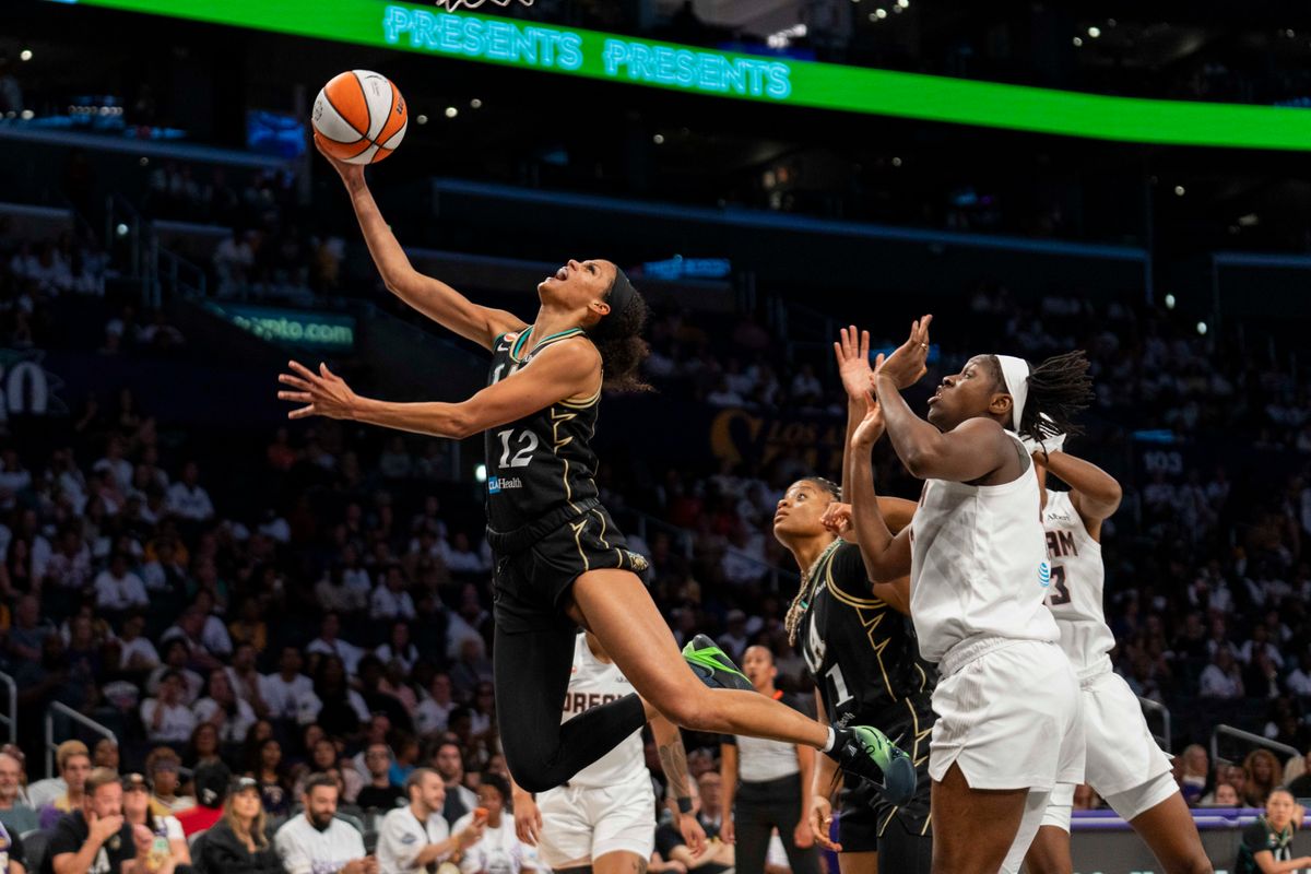 Los Angeles Sparks forward Rae Burrell (12) gets fouled on a layup attempt during a WNBA game against the Atlanta Dream, Thursday August 20th, 2026 in Los Angeles, California. Los Angeles Sparks forward Rae Burrell (12) gets fouled on a layup attempt during a WNBA game against the Atlanta Dream, Thursday August 20th, 2026 in Los Angeles, California.