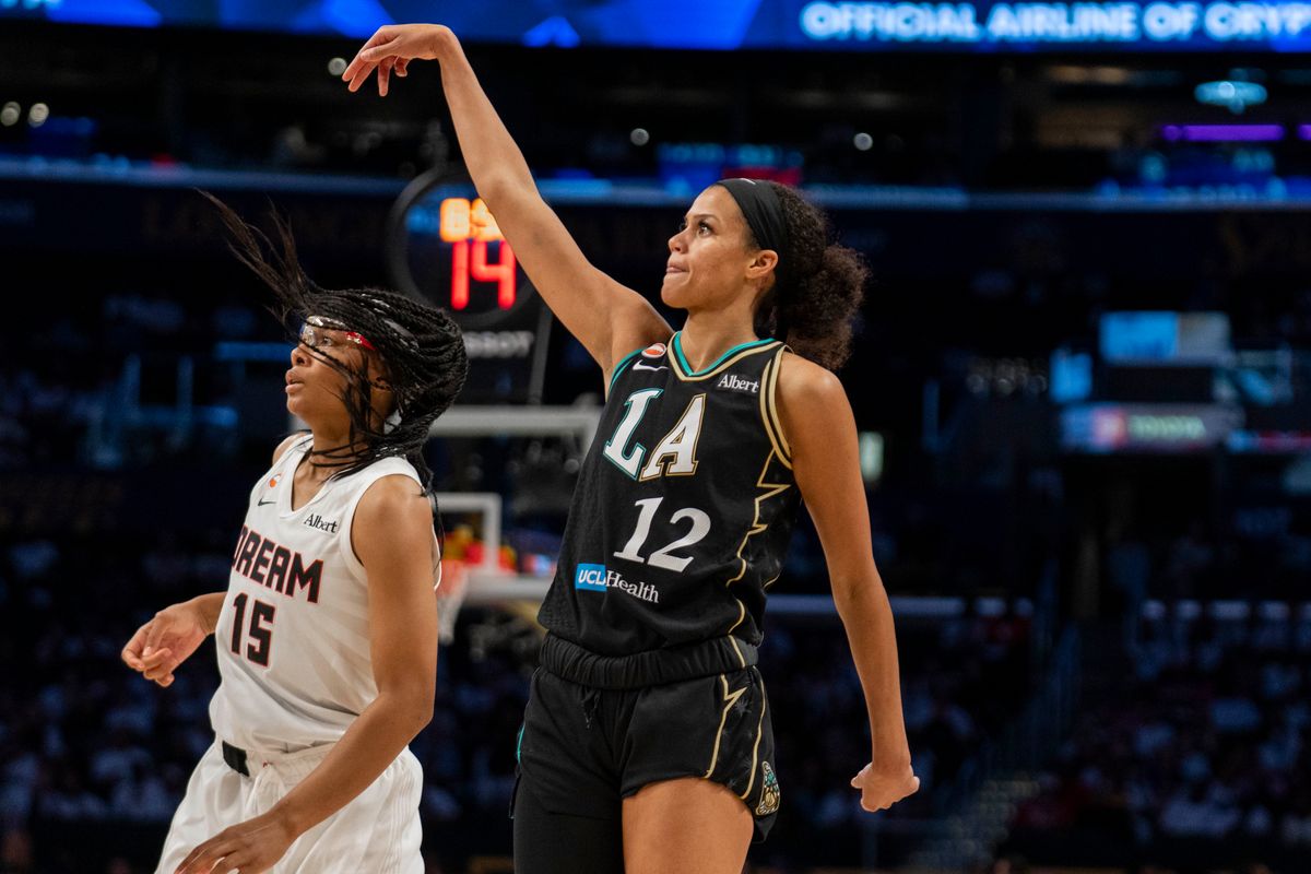 Los Angeles Sparks forward Rae Burrell (12) shoots a three during a WNBA game against the Atlanta Dream, Thursday August 20th, 2026 in Los Angeles, California. Los Angeles Sparks forward Rae Burrell (12) shoots a three during a WNBA game against the Atlanta Dream, Thursday August 20th, 2026 in Los Angeles, California.